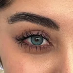 عکس لنز آرکتیک بلو اماندا روی چشم مشکی عکس لنز آرکتیک بلو اماندا روی چشم مشکی